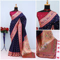 Has floral and peacock motifs on the zari border and pallu - NAVY BLUE