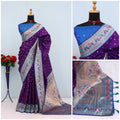 Has floral and peacock motifs on the zari border and pallu - PURPLE