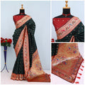 Has floral and peacock motifs on the zari border and pallu - DARK GREEN