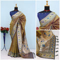 Has floral and peacock motifs on the zari border and pallu - BROWN